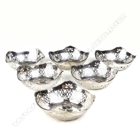 A set of six small silver bonbon dishes