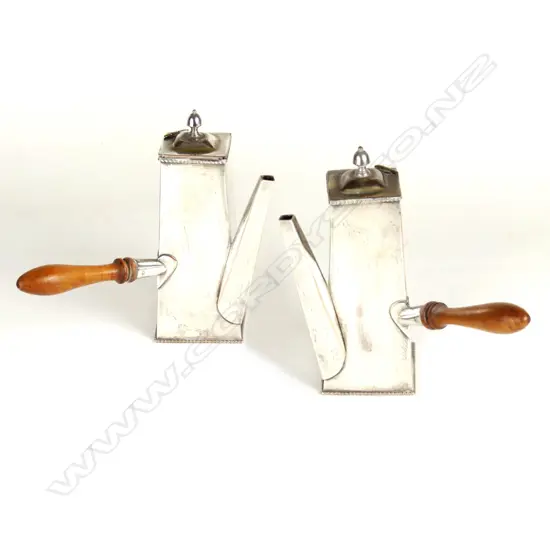 A pair of Edwardian silver plated chocolate pots