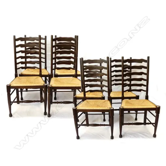 Eight pine ladderback chairs