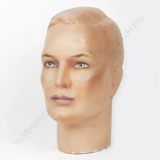 A vintage male mannequin head