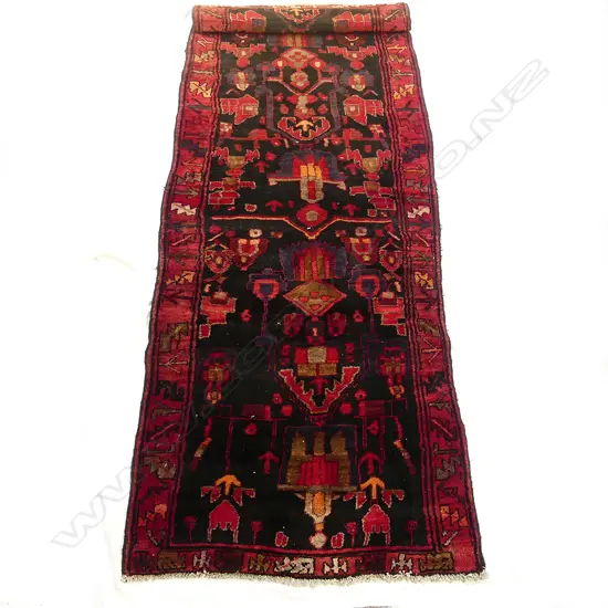 A semi-antique Persian Meshkin runner rug