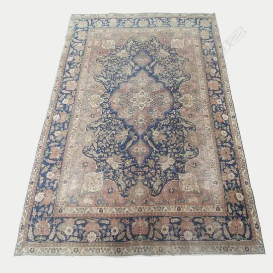 An antique Tabriz carpet