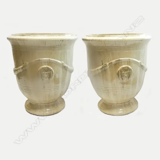 A pair of large antique French style pottery garden urns