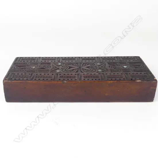 An early 20thC Maori carved cribbage board