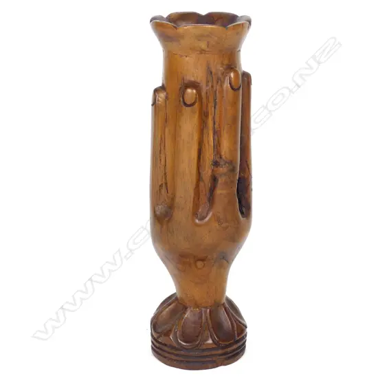 A vintage Pitcairn Island carved tou wood hand vase