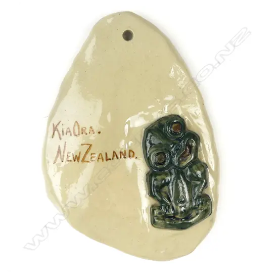 A Molle (Molly Goodsell) hand sculpted pottery tiki wall plaque