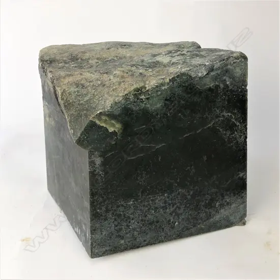 A N.Z. greenstone cut block from a river worn boulder