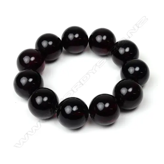 A dark red amber large bead bracelet
