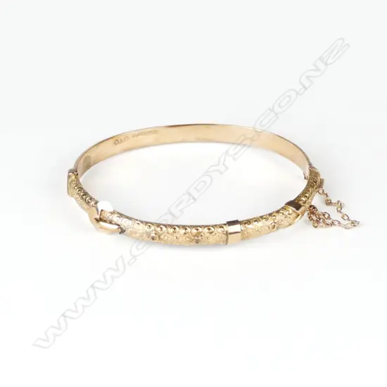 A c.1900 English 9ct. rose gold hinged bangle