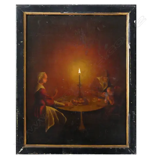 A Dutch 19thC candlelit interior scene
