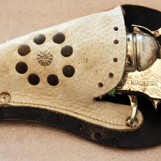 Two original die cast cap guns made in NZ/Australia