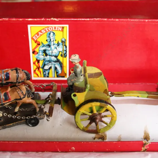 Rare horse drawn WWI German Field Kitchen with two tinplate horse-drawn camouflage painted vehicles and two Elastolin horses mounted on wheeled wooden bases with seated Elastolin Soldiers (two soldiers missing) all in original excellent condition including box