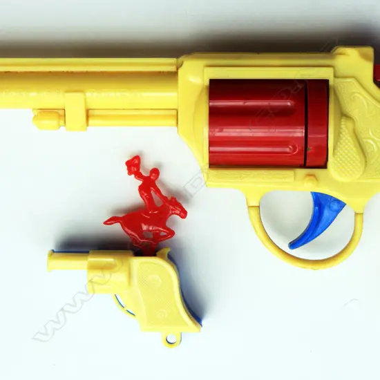 A pair of hard plastic yellow and blue Cowboy guns. Horse and rider on top of barrel bucks when trigger activated. Very rare survivors from the 1950’s by Renwal Toys