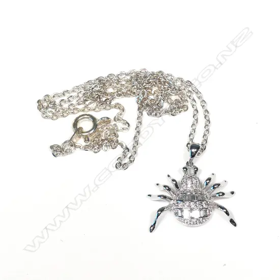 An 18ct white gold and diamond pendant