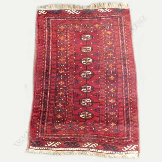 A small hand knotted Persian Turkman rug