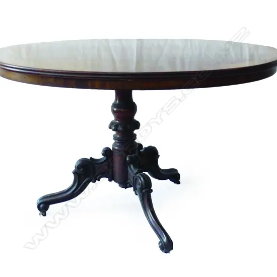 A Victorian flame mahogany occasional table