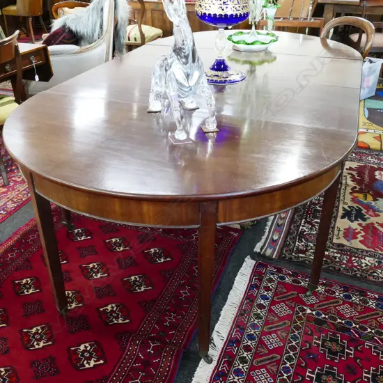 A Regency mahogany D-end extension dining table