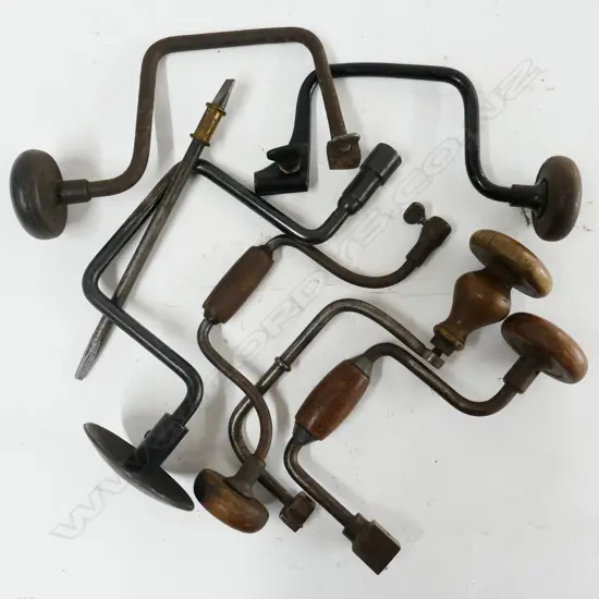 Six vintage metal armed braces