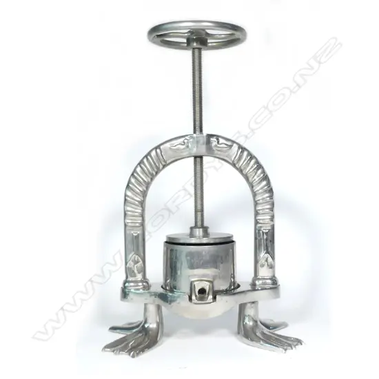 A French plated brass presse à canard