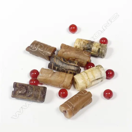 Eight various Chinese jade cylinder beads