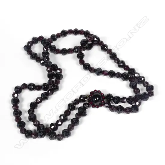 A c.1900 faceted garnet double strand necklace