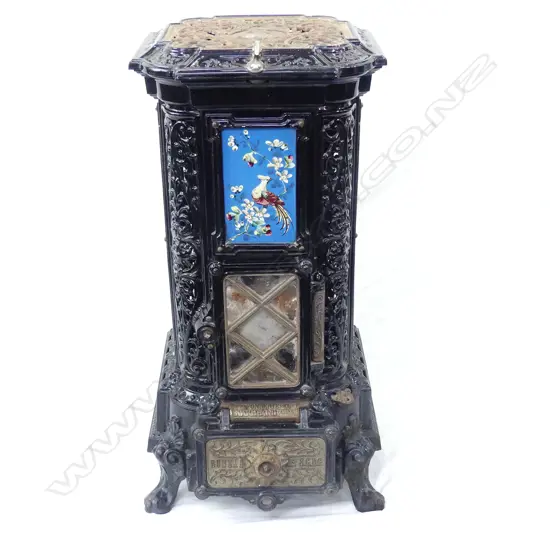 A 19thC highly ornate French cast iron heater