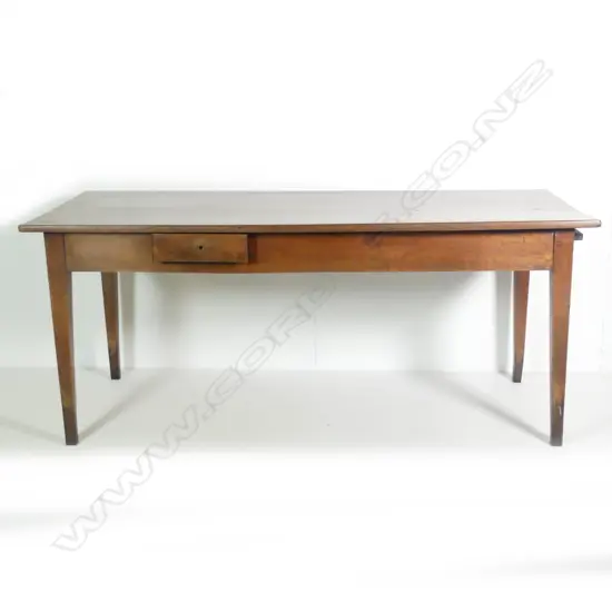 A country fruit wood dining table