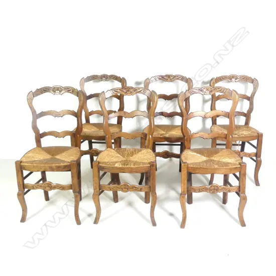 Six oak rush seated dining chairs