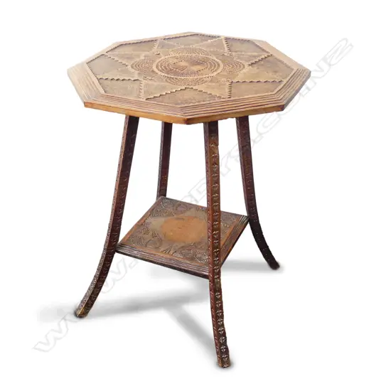 A colonial kauri chip art carved occasional table