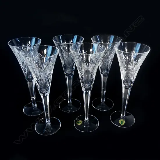 Six Waterford crystal champagne flutes