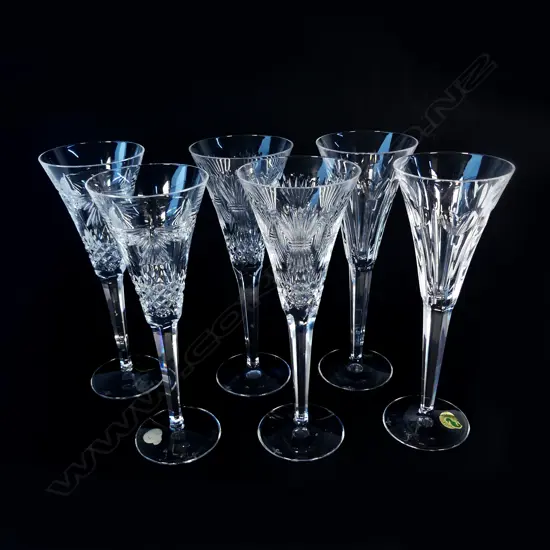 Six Waterford crystal champagne flutes