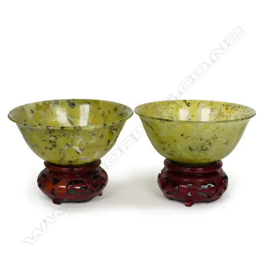 A pair of Chinese spinach jade bowls