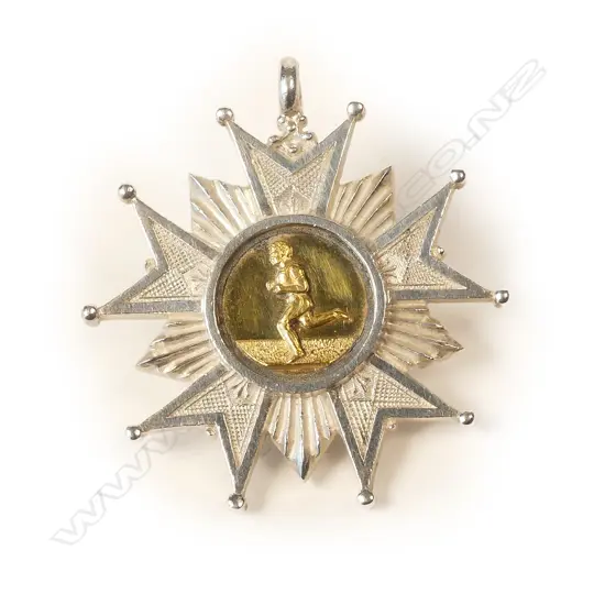 A 19thC Anton Teutenberg 1887 silver five point ball tipped star medallion