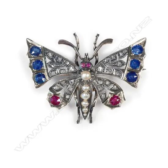 An impressive c.1900 9ct. yellow and white metal gem set butterfly brooch