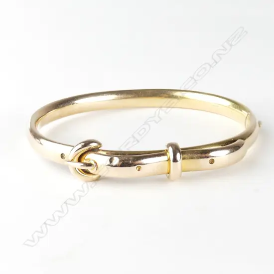 A vintage 9ct gold hinged bangle
