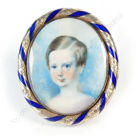 An early 19thC gold and enamelled framed portrait miniature of a young boy