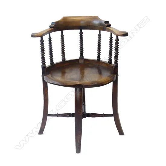 An Edwardian mahogany captain’s chair