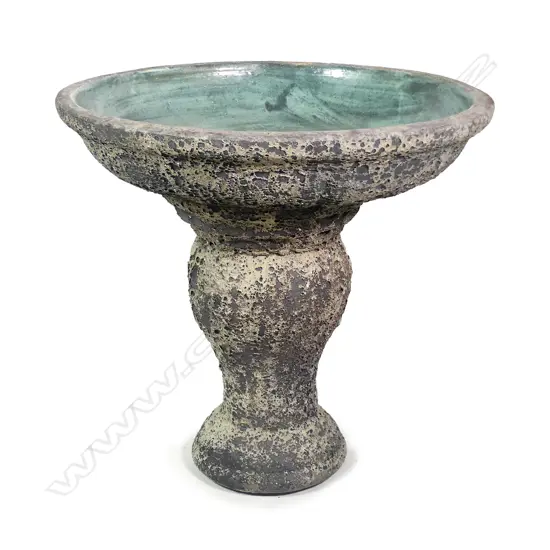 A large plain classical bird bath