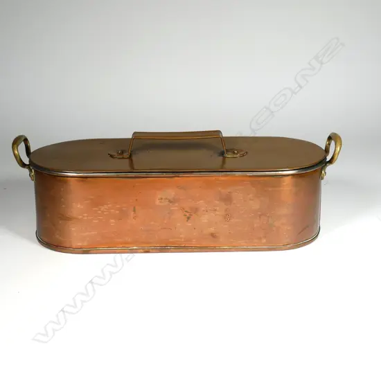 A copper fish poaching pan