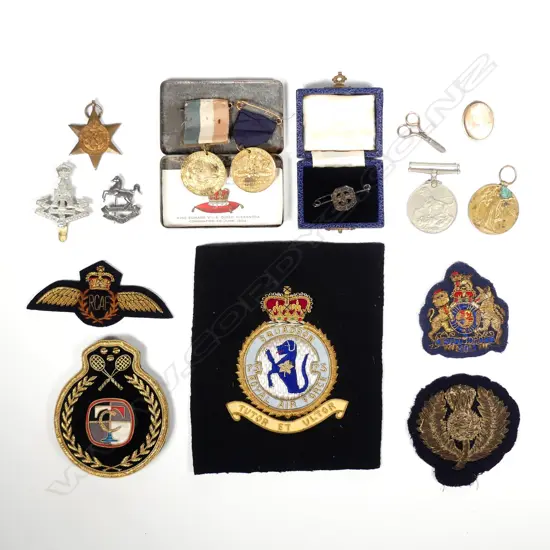 A collection of various badges and medals