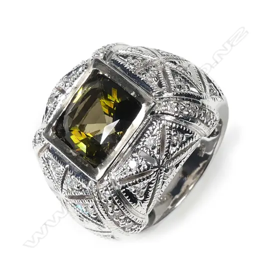 A large 14ct white gold green tourmaline and diamond ring