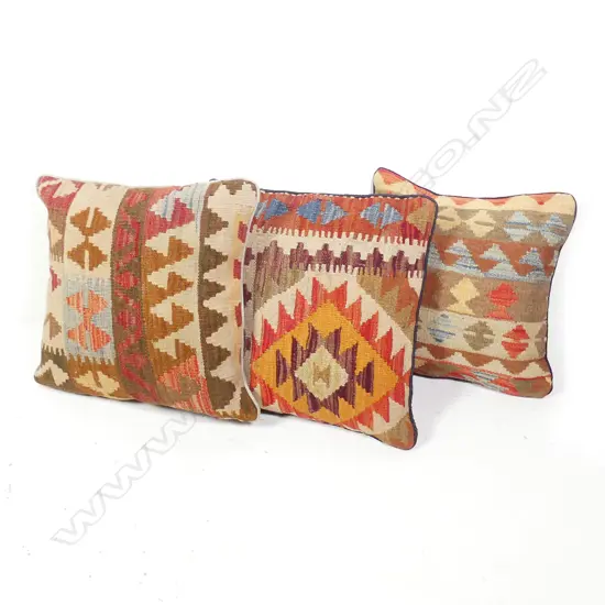 Three scatter cushions with faces made of Afghan kilim weave