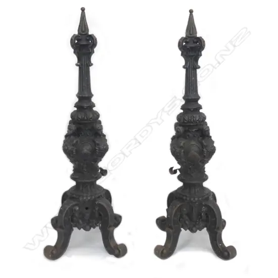A pair of old cast iron andirons