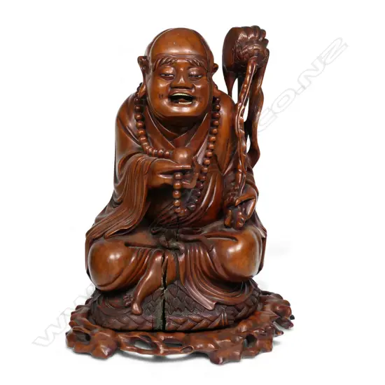 A 19thC heavy hardwood Chinese Laughing Buddha,