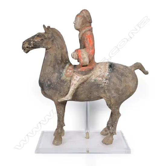 A reputedly Han Dynasty pottery horse and rider,