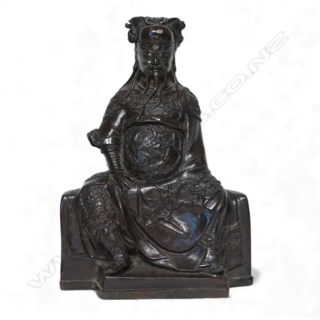 A Chinese reputedly Ming bronze model of a seated and bearded official, Image 1++