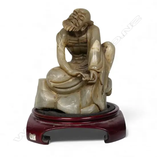 A Chinese carved soapstone of Da Mo,