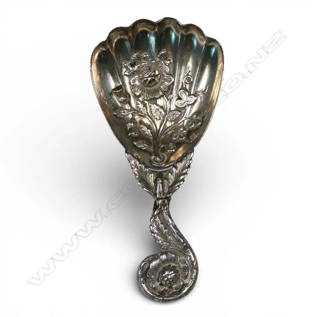 A late Victorian fancy silver embossed caddy spoon, Image 1++