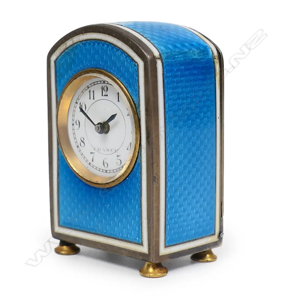 An early 20thC French silver and enamel miniature travelling clock, Image 1++