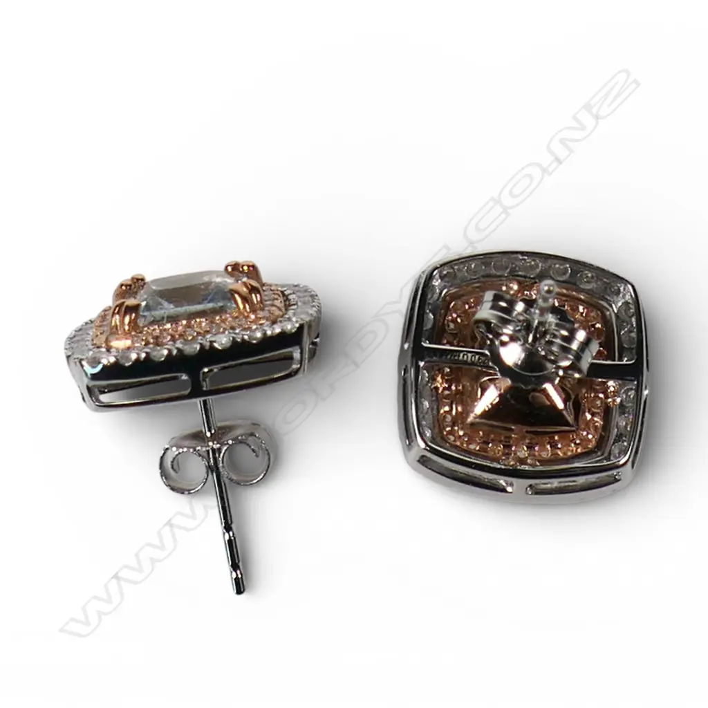 A pair of 14ct white and rose gold aquamarine and diamond stud earrings, Image 1++